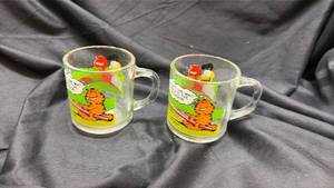 lot 645 image: Garfield Glass Coffee Mugs Set of 2