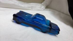 lot 710 image: Avon After Shave Blue Glass Classic Car Bottle - Empty. (No Sticker)