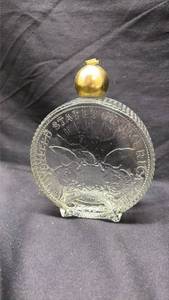 lot 712 image: Avon After Shave Glass Bottle Shaped Coin - Empty. (No Sticker)