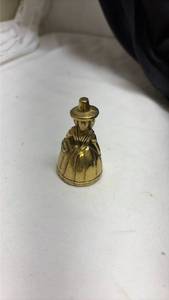 lot 722 image: Mini Brass Welsh Lady Figurine Bell made in England.