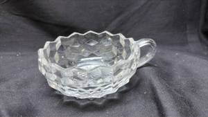 lot 725 image: Pressed Glass Nappy Bowl with Handle - Manganese Glow.