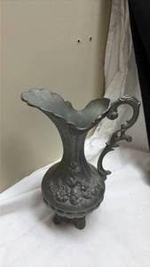 lot 734 image: Large Pewter Decorative Pitcher with Floral Relief Design. (No markings)