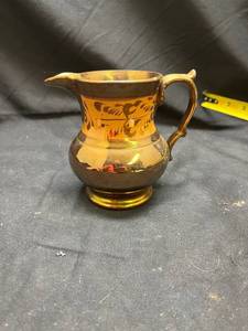 lot 783 image: Amber Glass Creamer Pitcher with Etched Floral Design