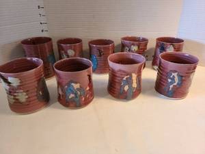 lot 1039 image: Handmade pottery cups by Jennie Becker, total of 9