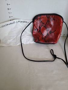 lot 1060 image: Donald J Pliner Red Python Snake Print Crossbody Bag