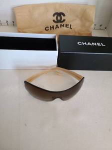 lot 1065 image: Chanel sunglasses with box and bag