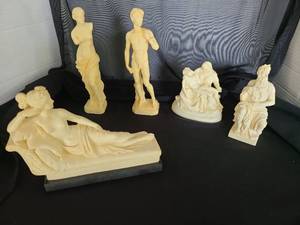 lot 1078 image: Five ivory colored figurines, tallest is 8.5in. Standing male has been glued