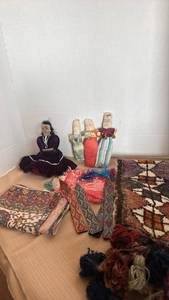 lot 1114 image: Genuine handwoven,m oriental rug, handmade folk art dolls, and more