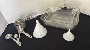 lot 1240 image: Kitchen Starter Set with Glass Baking Dishes, Measuring Cups, and Funnels