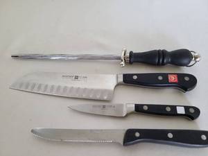 lot 1253 image: Wusthof and Winco knives, plus a sharpener