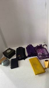 lot 1503 image: Gloves, lipstick case, wallets and more