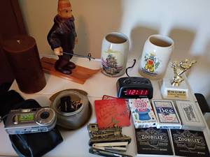 lot 1610 image: Home Decor. Wooden, Hand Carved Romer, Skier, Beer Steins, Alarm Clock, Sony Digital Camera and More