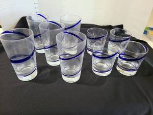 lot 1282 image: Clear Glass Drinkware Set with Blue Rim Accents, total of 9 glasses