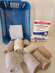 lot 1706 image: Elastic back brace, Ace bandages, wound dressings.