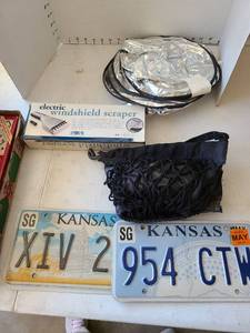 lot 3017 image: Automotive cargo net, electric windshield scraper, more
