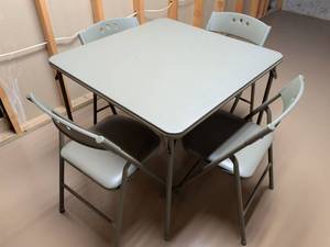 lot 5 image: Cosco 5-Piece Folding Card Table and Chairs Set