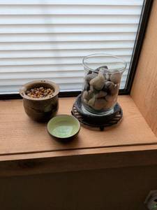 lot 33 image: River Stones and Ceramic Bowl and Glass Vase