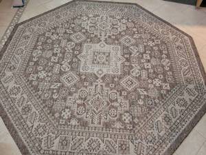 lot 71 image: Large Octagonal Area Rug with Geometric Pattern