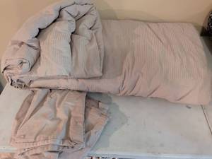 lot 96 image: Tan striped Comforter Bedding with two pillow cases.
