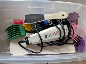 lot 111 image: Wahl Pet Clipper with Colorful Guide Combs and Nail File