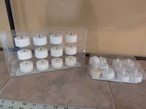 lot 117 image: Embers by Bombay 12-Piece LED Wax Tealight Set