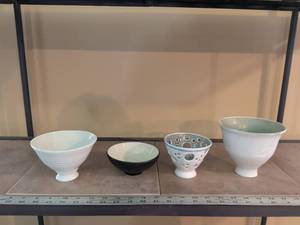 lot 148 image: Set of 4 Handmade Ceramic Bowls with Varied Designs