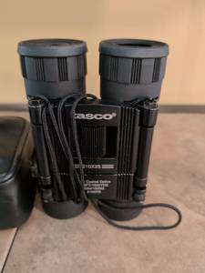 lot 152 image: Tasco 10x25 Compact Binoculars with Case