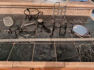lot 233 image: Utensil holder dough cutter candle holder and candle and small flower pot stands ice cream scoop mirror