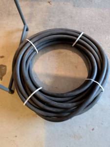 lot 312 image: Black Rubber water Hose