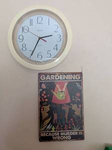 lot 392 image: Gardening Because Murder is Wrong Metal Sign and Linden Quartz Wall Clock Set