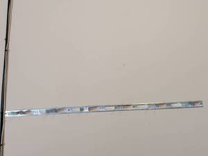 lot 404 image: Metal wall hanging with hooks to hang things