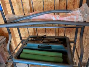 lot 435 image: Tote, pool noodle, pipe insulation and PVC garden pieces
