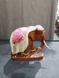 lot 3362 image: Hand Carved Wooden Elephant Figurine with Pink Fabric Drape and Tassels
