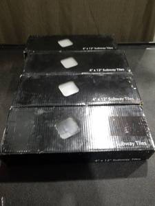 lot 3383 image: (21) EliteTile Sierra 12 x 4 Polished Glass Grand Subway Tile in Ice White