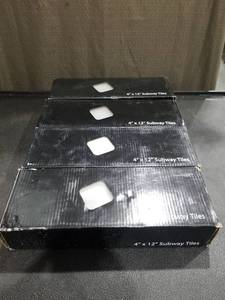 lot 3384 image: (24) EliteTile Sierra 12 x 4 Polished Glass Grand Subway Tile in Ice White