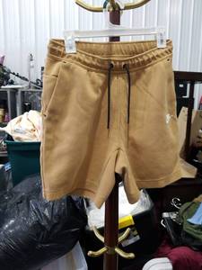 lot 3496 image: Nike Tan Drawstring Shorts Size Small