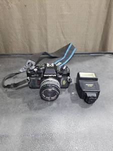 lot 3531 image: Olympus OM PC 35mm SLR Camera with 50mm Lens and Flash