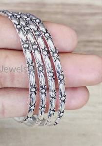 lot 2818 image: Silver-Tone Metal Bangles Set with Filigree Pattern
