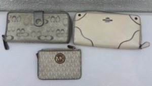 lot 13 image: Designer Wallet Collection Set of 3