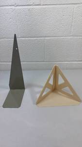 lot 33 image: Modern Metal Triangular Stand with Geometric Base