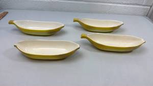 lot 59 image: Set of 4 Yellow Ceramic Oval Serving Dishes