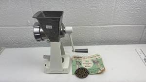 lot 64 image: Universal Dazey Table-Top Food & Meat Chopper with Manual