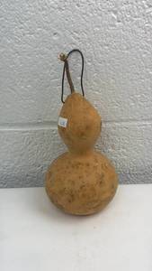 lot 72 image: Natural Dried Gourd with Wire Handle