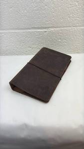 lot 77 image: Brown Leather Travelers Journal
