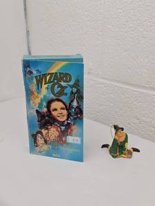 lot 99 image: The Wizard of Oz 50th Anniversary VHS with Scarecrow ornament