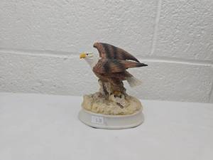 lot 101 image: Hand-Painted Bald Eagle Figurine Music Box