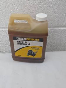 lot 150 image: Central Pneumatic 32 fl oz Air Compressor Oil