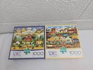lot 174 image: Charles Wysocki 1000 Piece Jigsaw Puzzles Set of 2