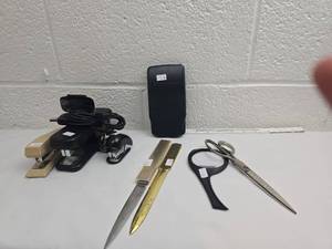 lot 184 image: Office Supply Lot with Staplers, Scissors, and Power Bank and logitech camera
