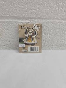 lot 187 image: Metal Angel Visor Clip with Gold Accents